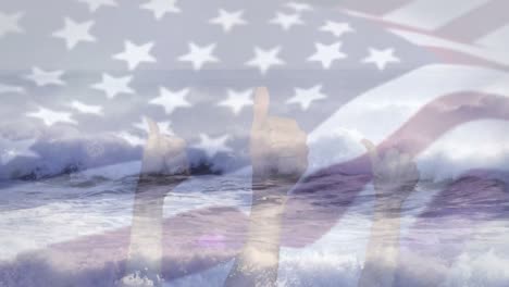 Digital-composition-of-waving-us-flag-over-hands-showing-thumbs-up-against-waves-in-the-sea