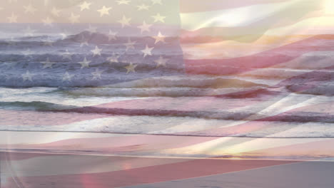 Animation-of-flag-of-usa-blowing-over-okay-hands-on-beach-landscape