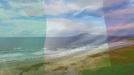 Animation-of-flag-of-italy-blowing-over-beach-landscape