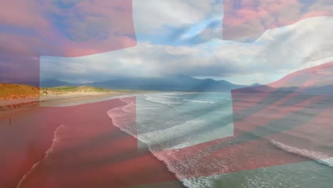 Animation-of-flag-of-switzerland-blowing-over-beach-seascape