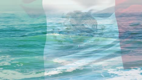 Digital-composition-of-waving-mexico-flag-against-waves-in-the-sea