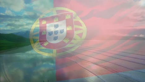 Digital-composition-of-portugal-flag-waving-against-aerial-view-of-waves-in-the-sea