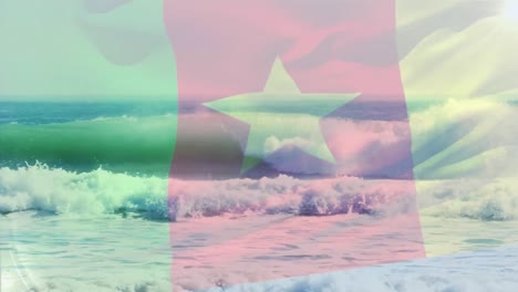 Digitale-Komposition-Der-Kamerunischen-Flagge,-Die-Vor-Der-Luftaufnahme-Der-Wellen-Im-Meer-Weht