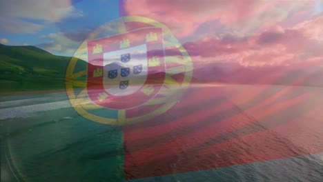 Digital-composition-of-portugal-flag-waving-against-aerial-view-of-waves-in-the-sea