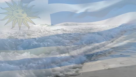 Digitale-Komposition-Der-Uruguayischen-Flagge,-Die-Vor-Der-Luftaufnahme-Der-Wellen-Im-Meer-Weht