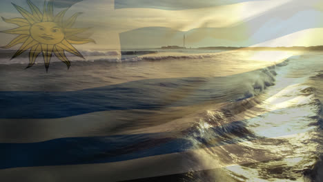 Digitale-Komposition-Der-Uruguayischen-Flagge,-Die-Vor-Der-Nahaufnahme-Der-Wellen-Am-Strand-Weht