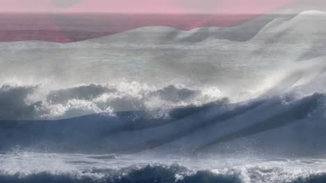 Digitale-Komposition-Die-Niederländische-Flagge-Weht-Vor-Der-Luftaufnahme-Der-Wellen-Im-Meer