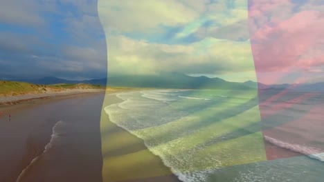 Digitale-Komposition-Der-Belgischen-Flagge,-Die-Vor-Der-Luftaufnahme-Der-Wellen-Im-Meer-Weht