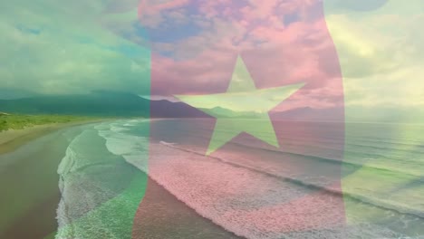Animation-Der-Flagge-Kameruns,-Die-über-Der-Meereslandschaft-Weht