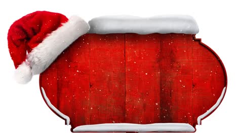 Schnee-Fällt-Und-Weihnachtsmütze-über-Rotem-Holzschild-Vor-Weißem-Hintergrund