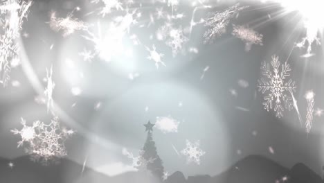 Animation-of-christmas-snow-falling-over-christmas-decorations-on-grey-background