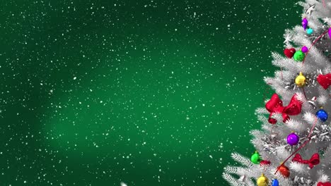 Animation-of-snow-falling-over-christmas-tree-with-copy-space-on-green-background