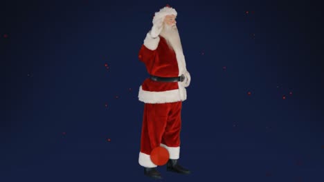 Animation-of-santa-claus-waving-with-red-spots-falling-over-blue-background