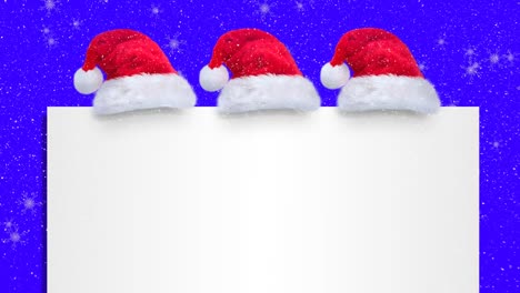 Animation-of-three-santa-hats-and-white-card-with-copy-space-over-snow-falling-on-blue-background