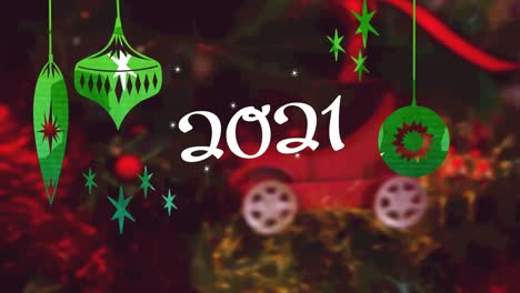 Animation-of-2021-and-baubles-over-christmas-decorations