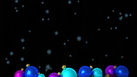 Animation-Von-Schneeflocken,-Die-über-Weihnachtskugeln-Auf-Schwarzem-Hintergrund-Fallen