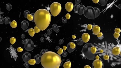 Animation-of-golden-and-black-balloons-flying-over-snow-on-black-background