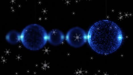Animation-of-snow-falling-over-christmas-baubles-on-black-background