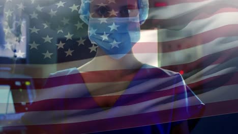 Animation-of-flag-of-usa-waving-over-surgeon-in-operating-theatre