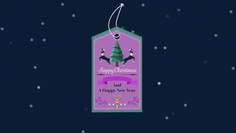 Animation-of-christmas-greetings-on-tag-over-snow-falling-on-navy-background