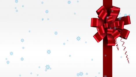 Animation-of-snow-falling-over-present-on-white-background