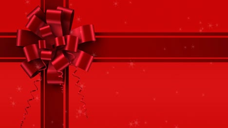 Animation-of-snow-falling-over-ribbon-on-red-background