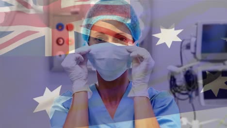 Animation-of-flag-of-australia-waving-over-anesthesiologist-in-operating-theatre