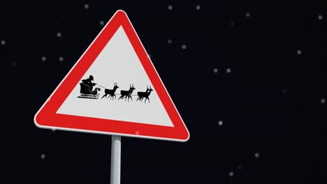 Animation-Von-Schnee,-Der-über-Das-Weihnachtsverkehrsschild-Auf-Schwarzem-Hintergrund-Fällt