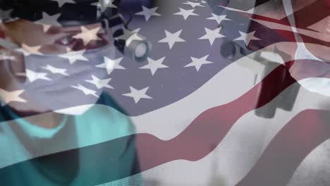 Animation-Der-Flagge-Der-USA,-Die-über-Chirurgen-Im-Operationssaal-Weht