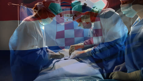 Animation-of-flag-of-croatia-waving-over-surgeons-in-operating-theatre
