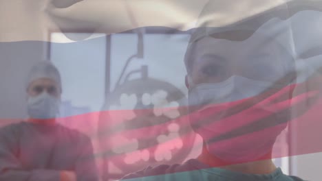 Animation-Der-Flagge-Russlands,-Die-über-Chirurgen-Im-Operationssaal-Weht