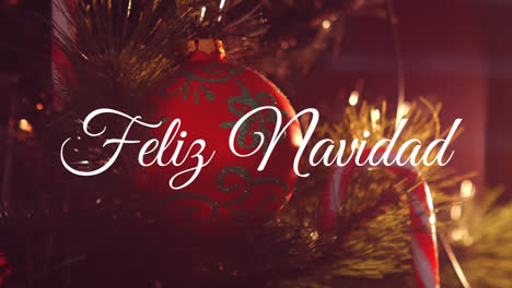 Animation-of-feliz-navidad-christmas-greetings-text-over-christmas-red-bauble-decoration