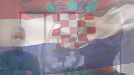 Animation-of-flag-of-croatia-waving-over-surgeons-in-face-masks