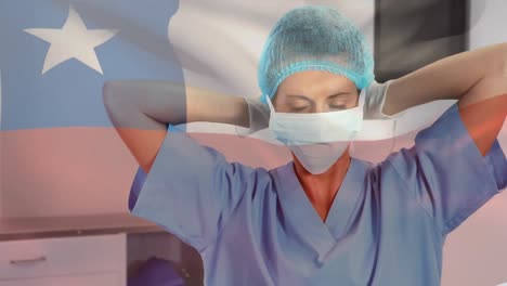 Animation-of-flag-of-chile-waving-over-surgeon-in-face-masks