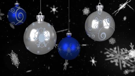 Animation-Von-Weihnachtsblasen-über-Schnee-Auf-Schwarzem-Hintergrund