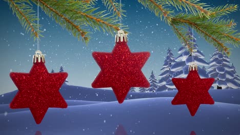 Animation-of-star-baubles-and-snow-falling-over-winter-scenery