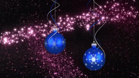 Animation-Von-Weihnachtsblasen-über-Sternen-Auf-Schwarzem-Hintergrund