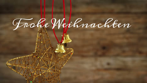 Animation-of-german-greeting-text-over-golden-bells-christmas-decorations