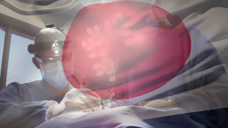 Animation-of-flag-of-japan-waving-over-surgeons-in-operating-theatre
