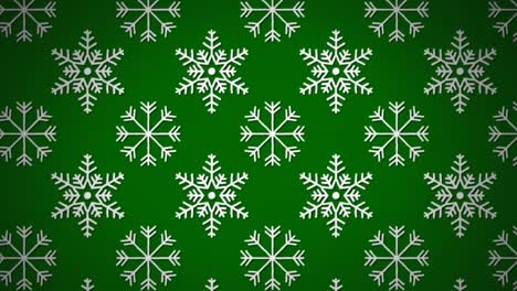 Animation-of-snowflakes-over-green-background