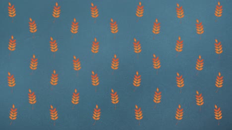 Animation-Von-Reihen-Orangefarbener-Herbstblätter-Auf-Blauem-Hintergrund