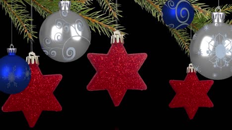 Animation-of-christmas-tree-decorations-moving-over-black-background