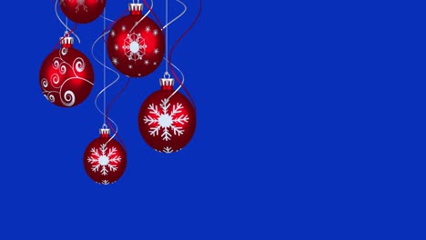 Animation-of-christmas-tree-balls-over-blue-background