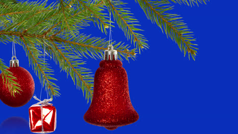 Animation-of-christmas-tree-decorations-over-blue-background