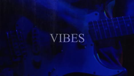 Animation-of-good-vibes-text-over-person-playing-guitar