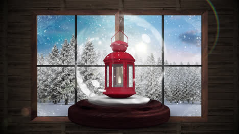 Animation-of-lantern-and-window-over-snow-falling-and-winter-landscape