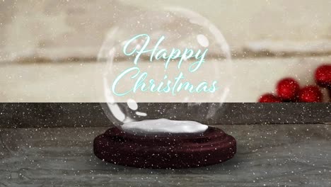 Animation-of-happy-christmas-text-in-snow-globe-on-wooden-table