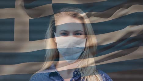 Animation-of-flag-of-greece-waving-over-woman-wearing-face-mask-during-covid-19-pandemic