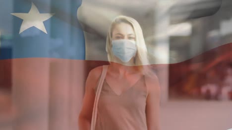 Animation-of-flag-of-chile-waving-over-woman-wearing-face-mask-during-covid-19-pandemic