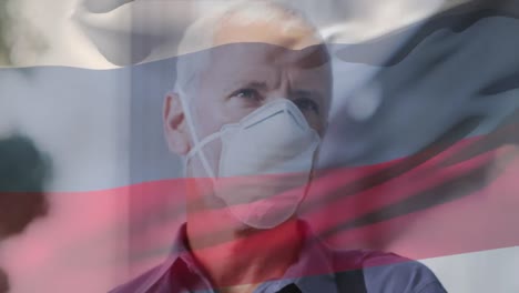 Animation-Der-Flagge-Russlands,-Die-Während-Der-Covid-19-Pandemie-über-Einem-Mann-Mit-Gesichtsmaske-Winkt
